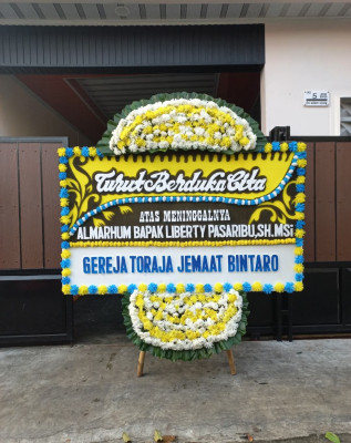 Papan Bunga Duka di Taman Baru